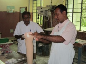 Technician making Artificial Limb